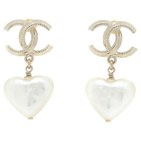 chanel pearl heart earrings|authentic Chanel pearl earrings.